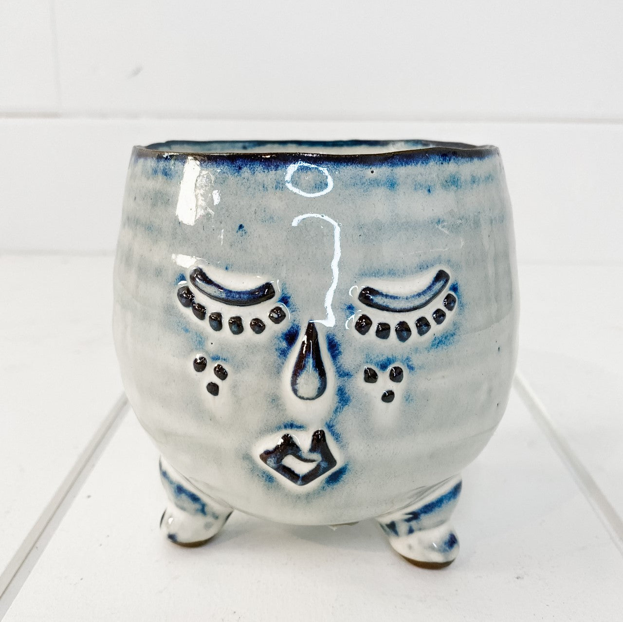 Blue face ceramic plant pot