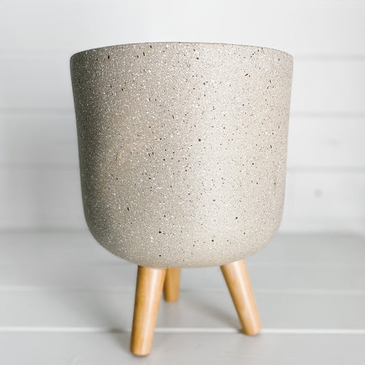 Beige Speckled Pot on Wooden Feet